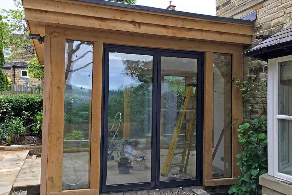 Reynaers CF77 Bi Fold doors installed at Baildon in West Yorkshire - side view 1