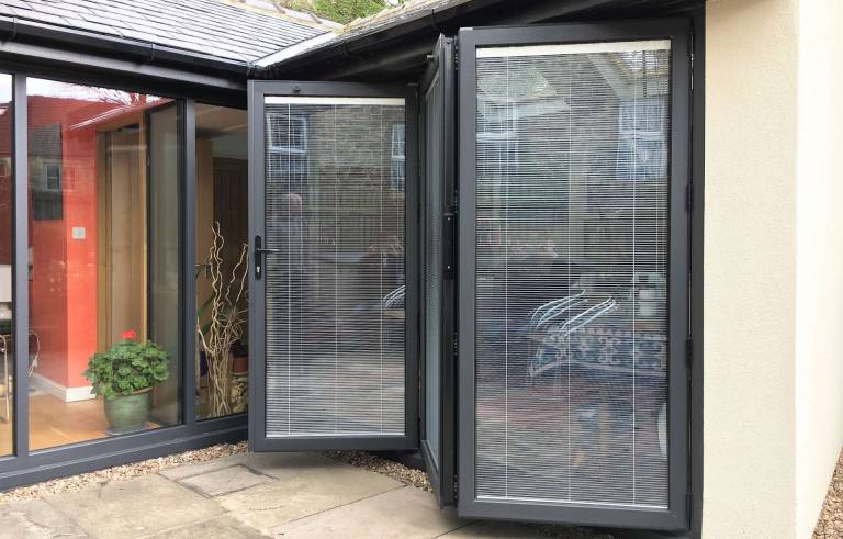 bifolding doors with built in integral blinds installed at new art studio in Addingham near Ilkley in Yorkshire