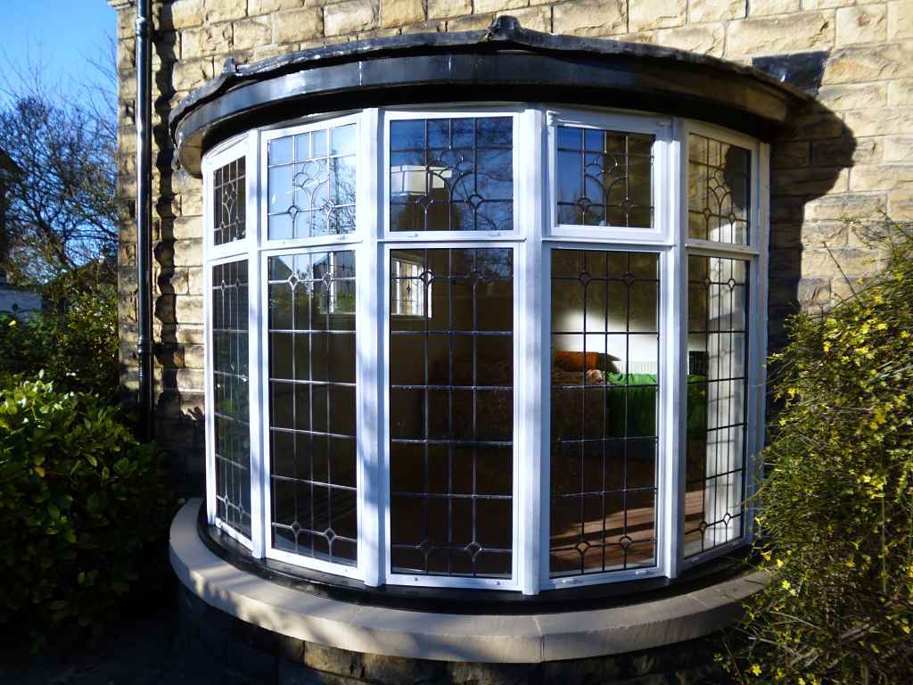 Aged lead work designs and soldered joints for an authentic period finish at Leeds in Yorkshire