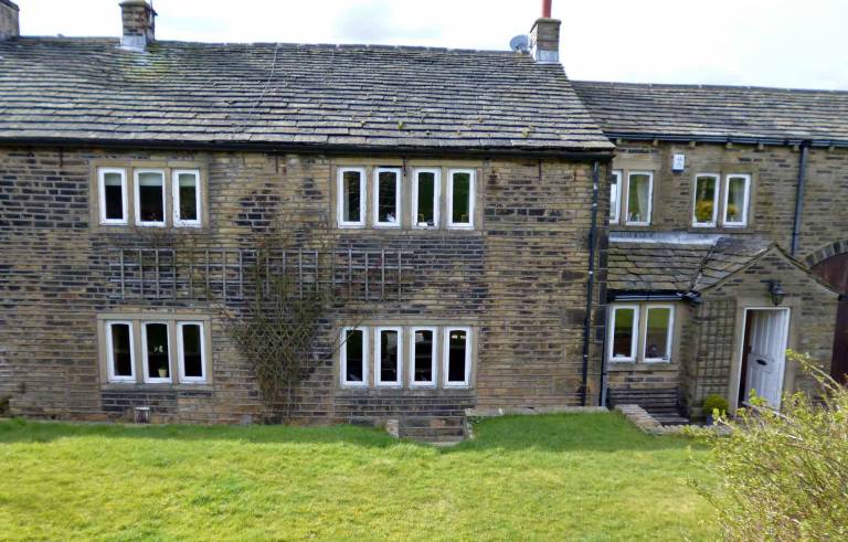 Before crittal steel window replacement at grade II listed farm house in Elland Halifax West Yorkshire.