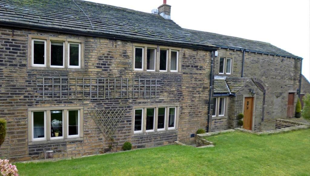 Heritage Alitherm 47 installed on this grade II listed farmhouse at Elland, Halifax