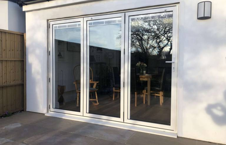 bifolding doors with built in integral blinds installed at 1970's semi at Otley in Yorkshire