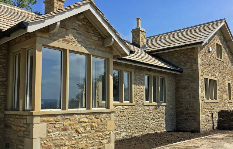 Smart Alitherm Heritage aluminium windows Installed at grade II listed old school house in Skipton North Yorkshire.