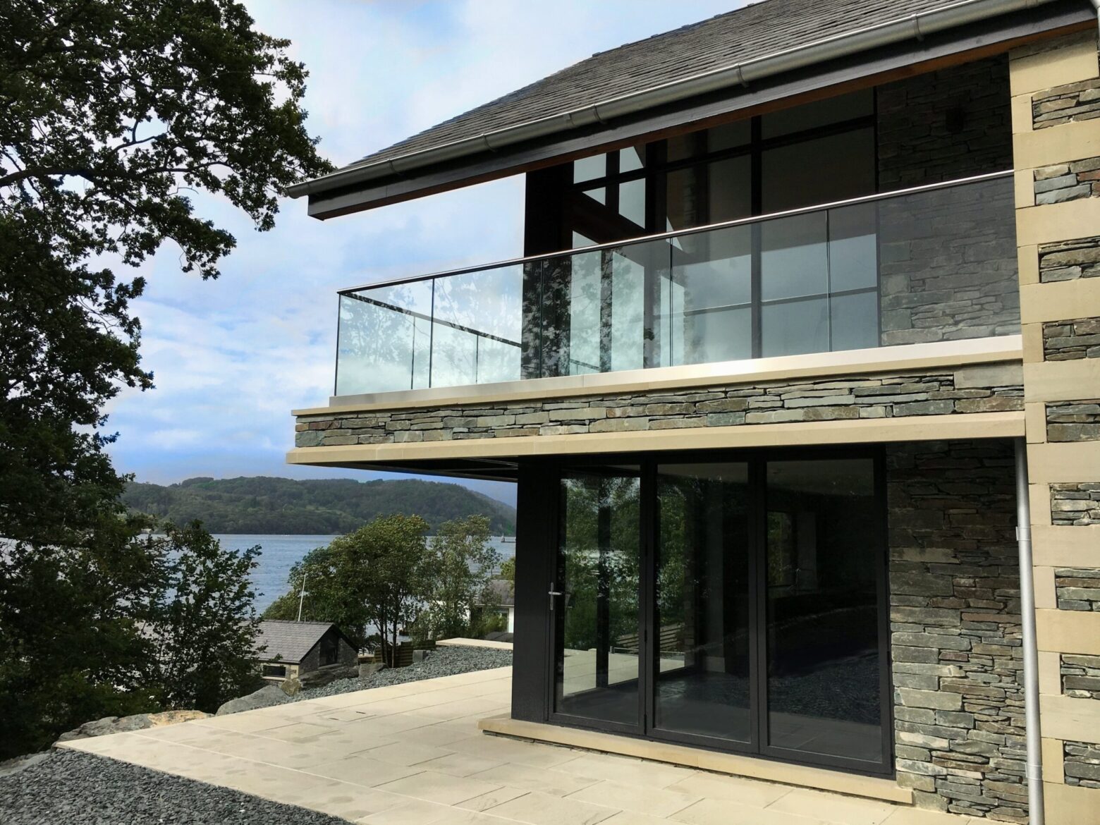 New build project in Windermere, Lake district including aluminium bifolding doors, casement windows and curtain wall